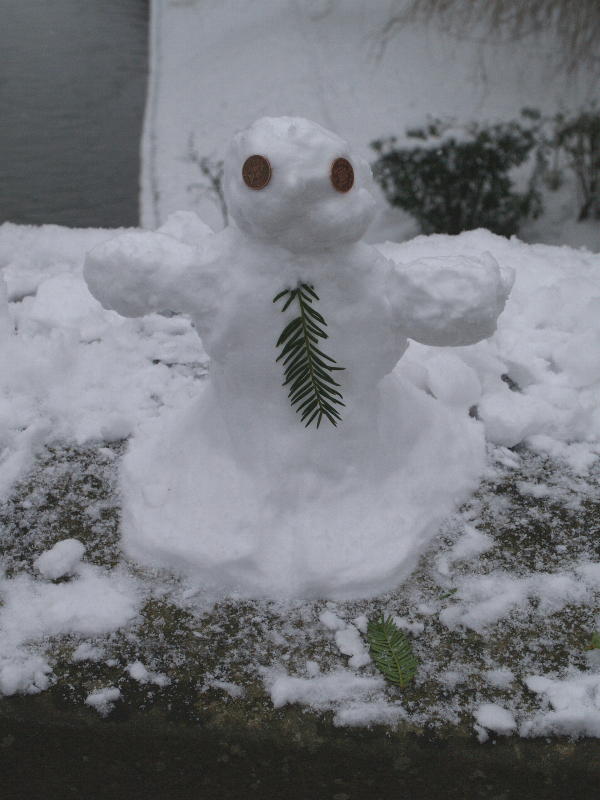 Miniature snow man, King's College, Cambridge, England