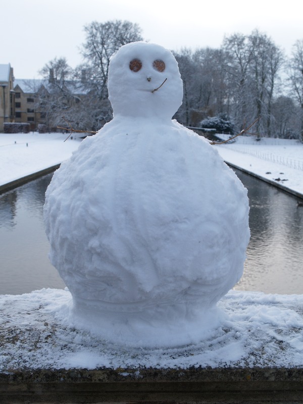 snow man (using bridge stone), Clare College, Cambridge, England