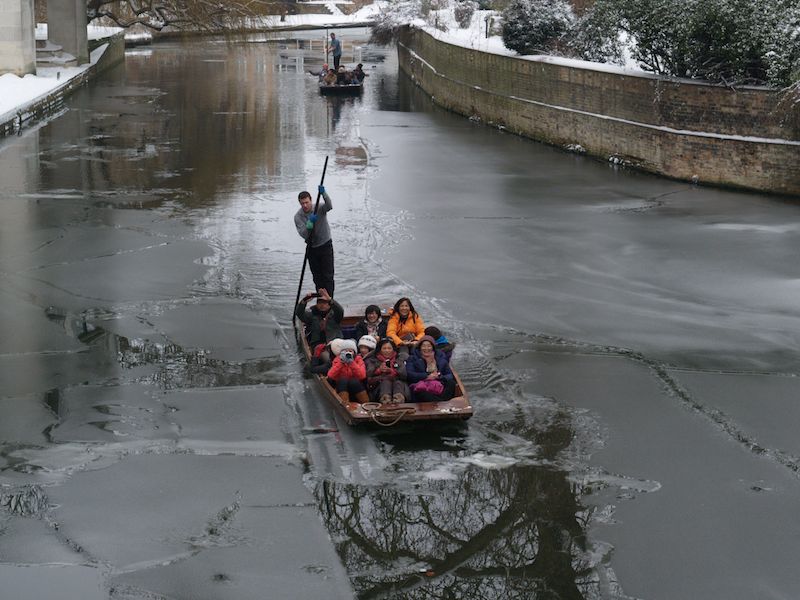 punting in slushy Cam, Cambridge, England