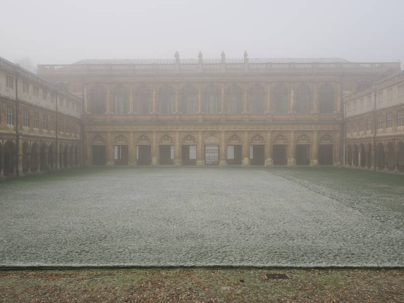 Wren Library in winter mist, Trinity College, Cambridge, England