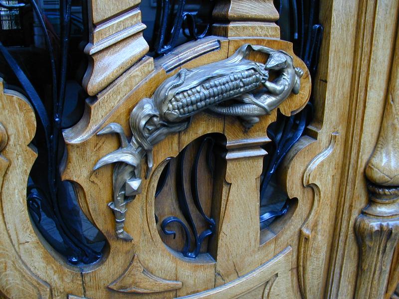 Paris, France: 151 Rue de Grenelle: lizard eating corn cob on door (art nouveau, 1898, architect Jules Lavirotte)