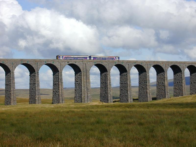Ribblehead, England: railway viaduct (on the Settle and Carlisle line, 24 arches, 32m high, 400m long, limestone, built 1870-1875, restored 1988-1991)