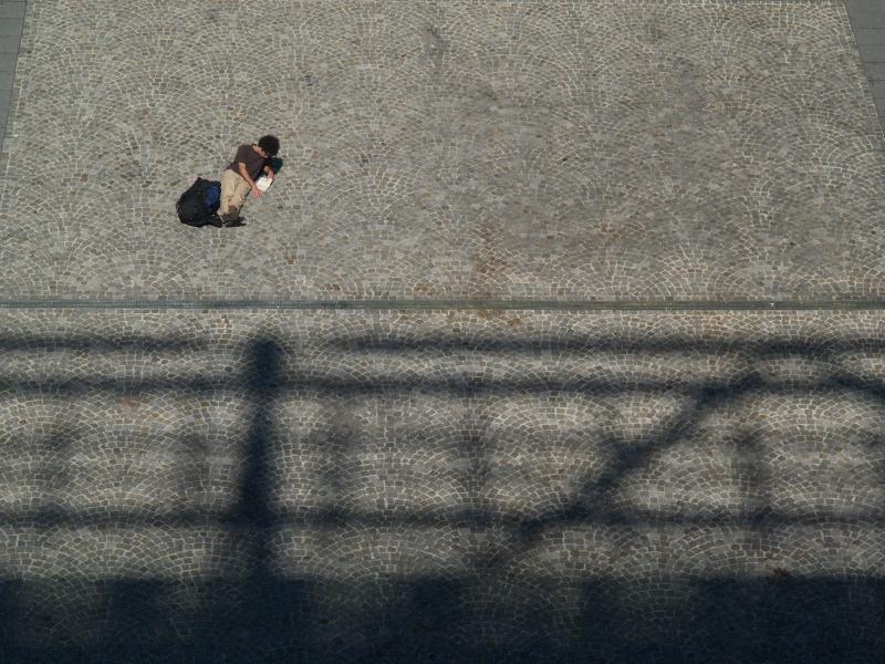 Paris, France: Beaubourg (Pompidou Centre): person reading in square
