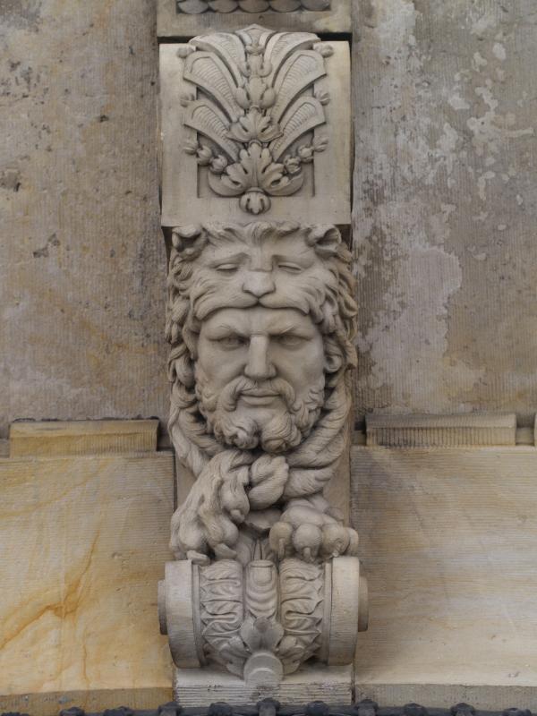 Berlin, Germany: Molkenmarkt 1: buttress decoration of man with lion wrap