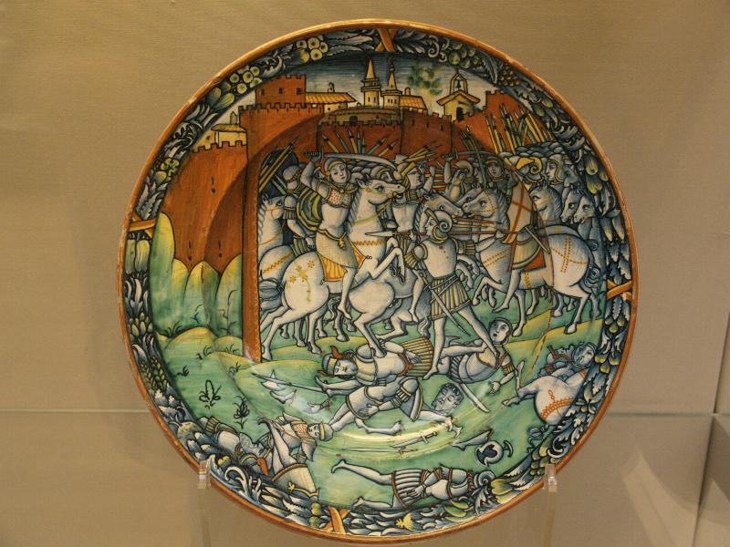 London, England: British Museum: dish, a battle scene at a city gate (Deruta, 1500-1520)