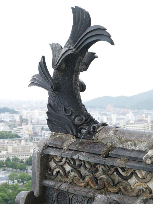Himeji, Japan: castle: fish (carp, koi?) decoration at top of roof