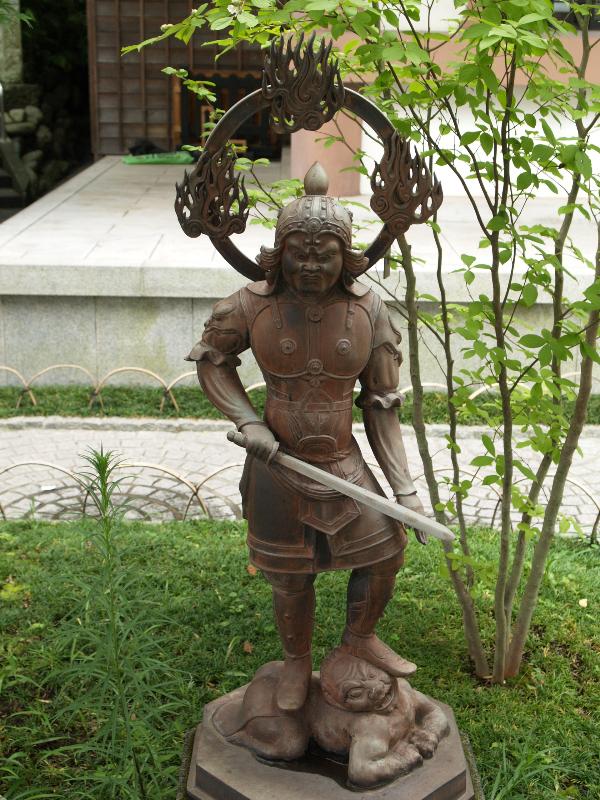 Kamakura, Japan: Hase-dera Temple: sculpture of a god