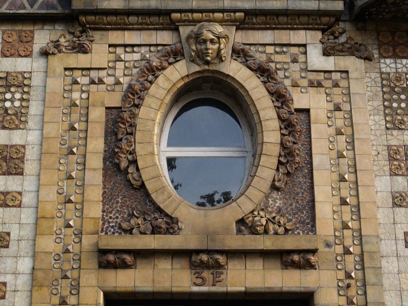 Paris, France: 31 bis Rue Campagne-Premiere: window (1911, architect Andre Arfvidson; tiles by Alexandre Bigot)