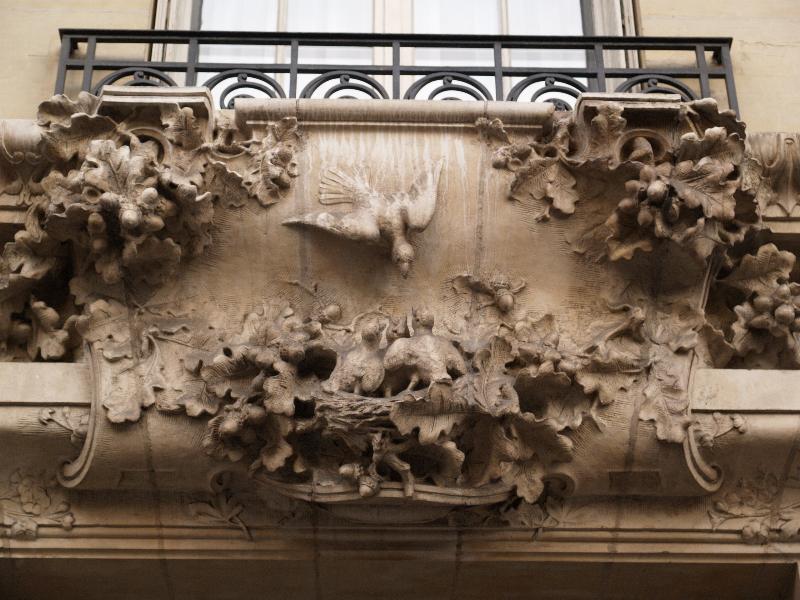 Paris, France: 97 Boulevard Raspail: sculpture over door of birds (1913, architect Eugene Chifflot)