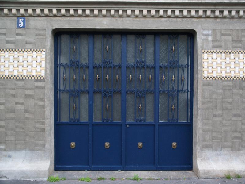 Paris, France: 5 Rue Victor Schoelcher: garage door (1911, architect Paul Follot)