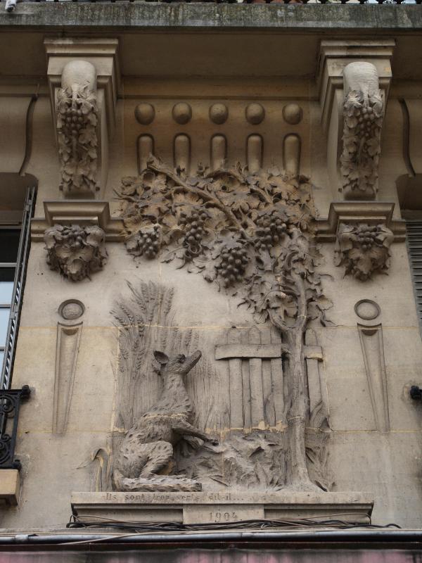 Issy-les-Moulineaux, France: 31 Rue Kleber: sculpture of The Fox and The Grapes (after La Fontaine) (1904, architect Durandaud, sculptor Lachesnee)