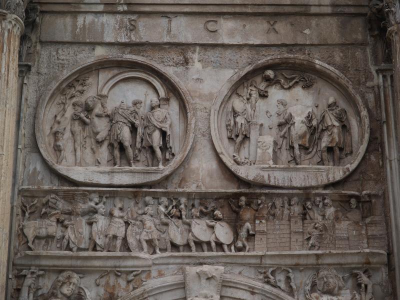 Rome, Italy: Arco di Trionfo di Constantio (Arch of Constantine): middle panel, west arch, south side (medallions with hunting scenes, frieze below depicts campaign against Maxentius) (monument built 315 AD)