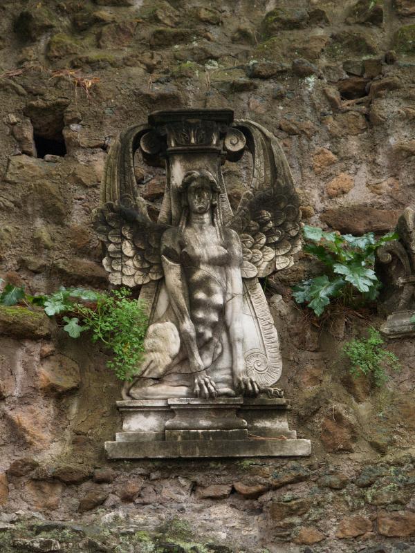 Rome, Italy: Palatino: wall sculpture of mythical winged creature