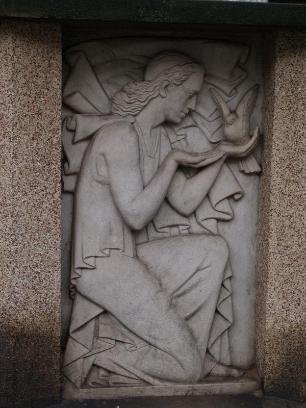 Paris, France: 102 Boulevard Brune: woman and dove (sculptor Albert David)
