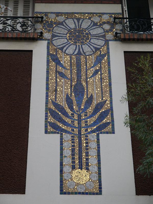 Paris, France: 27 Square de Montsouris: tile decoration on wall