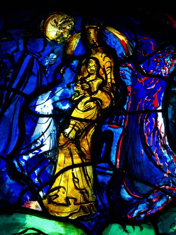 Cambridge, England: Robinson College: chapel small window detail (Mother and Child) (c1980, designed by John Piper, made by Patrick Reyntiens)
