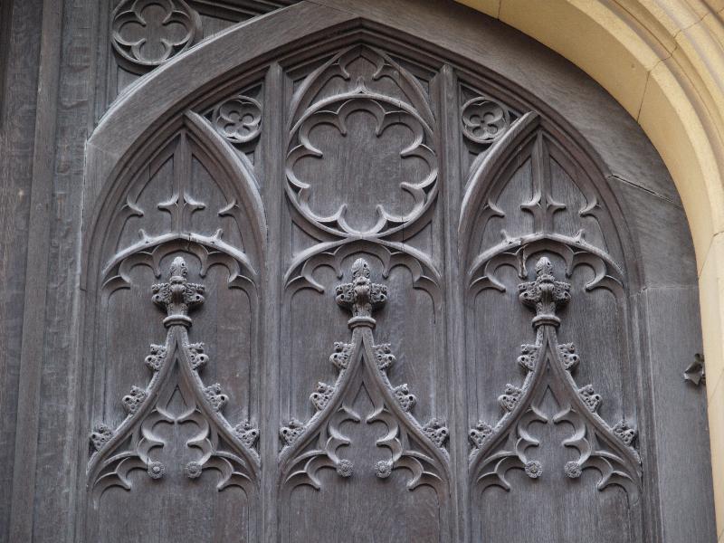 Cambridge, England: King's College: gatehouse door detail