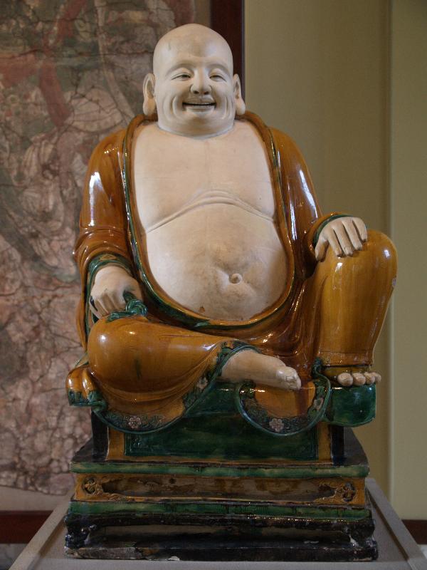 London, England: British Museum: stoneware figure of Budai (dated AD 1486, Ming dynasty, Henan Province, China)