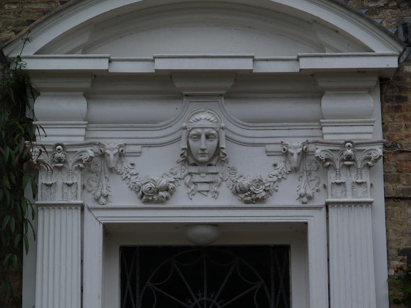 Cambridge, England: 11 Grange Road: relief above door (1912, architect A.J. Winter Rose)
