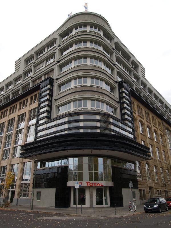Berlin, Germany: Mosse Publishing House (at time of photo, Total) (corner of Jerusalemstrasse and Schutzenstrasse): view (1921-1922, Erich Mendelsohn; renovated 1995, Jurgen Fissler and Hans-Christof Ernst)
