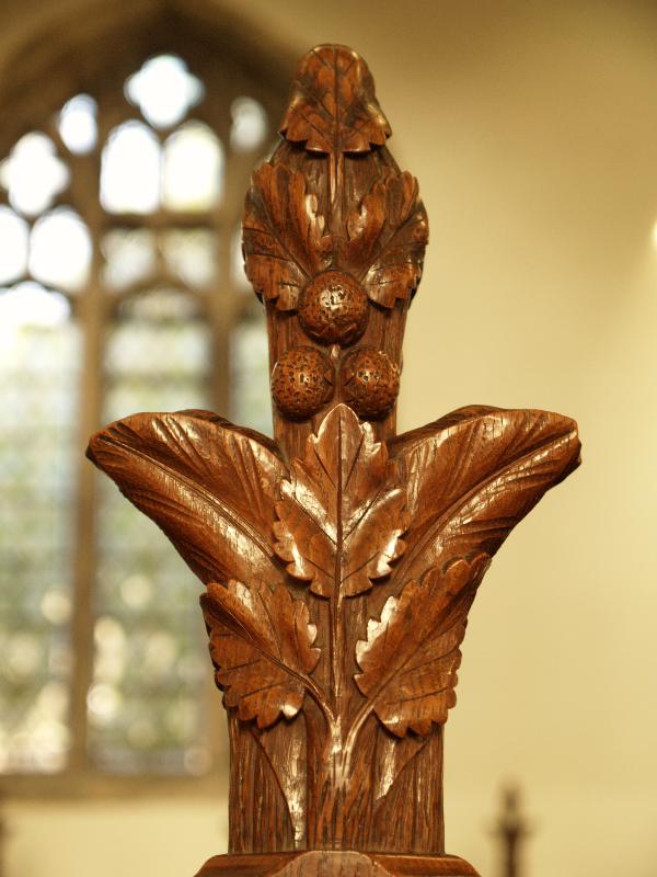 Cottenham, England: All Saints Church: pew bench carving (1867)