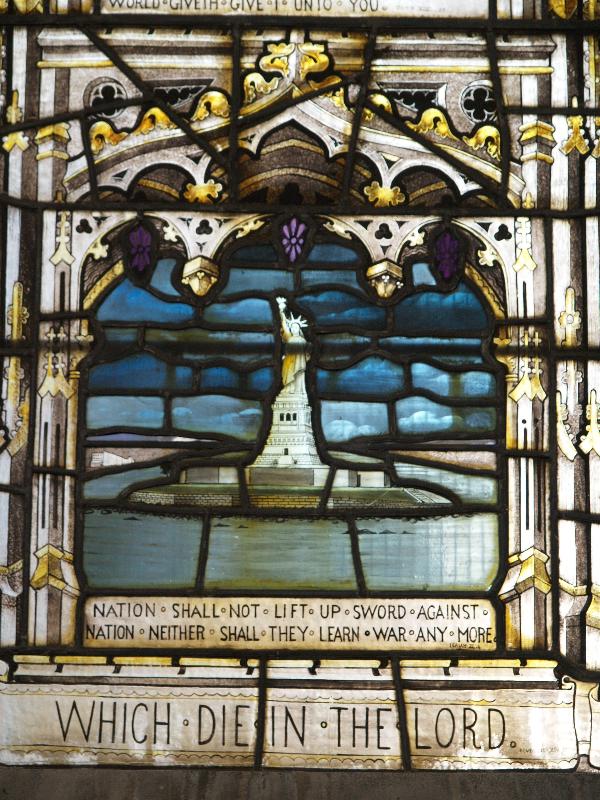 Swaffham Prior, England: St Mary's Church: Great War (World War I) middle memorial window (Statue of Liberty) (1919, designed by T F Curtis, made by Ward and Hughes)