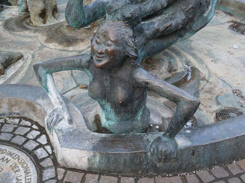 Karlsruhe, Germany: Lammstrasse: 'Jungbrunnen mit Vierdimensionalem Luftsprung', young woman emerging from water (Fountain of Youth, Fountain of the Lamb) (1983-1986, sculptor Karl-Henning Seemann)