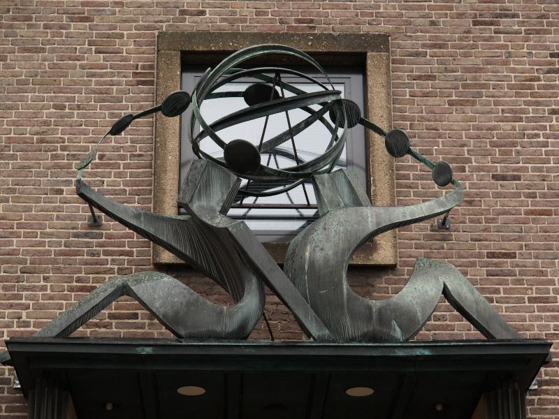 Nijmegen, Netherlands: Nederlandsche Bank (formerly) (Klein Marienburg): 'Het Geldverkeer'' (the money changers) (1954, sculptor Charles Hammes; building architect Ir. H.T. Zwiers)