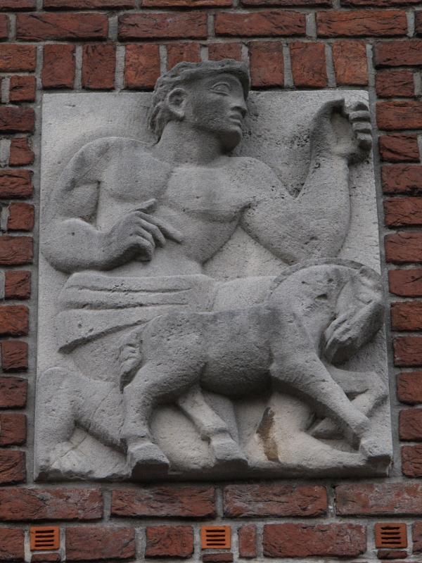 Nijmegen, Netherlands: train station (Stationsplein): male relief (1953, sculptor Jo Uiterwaal)