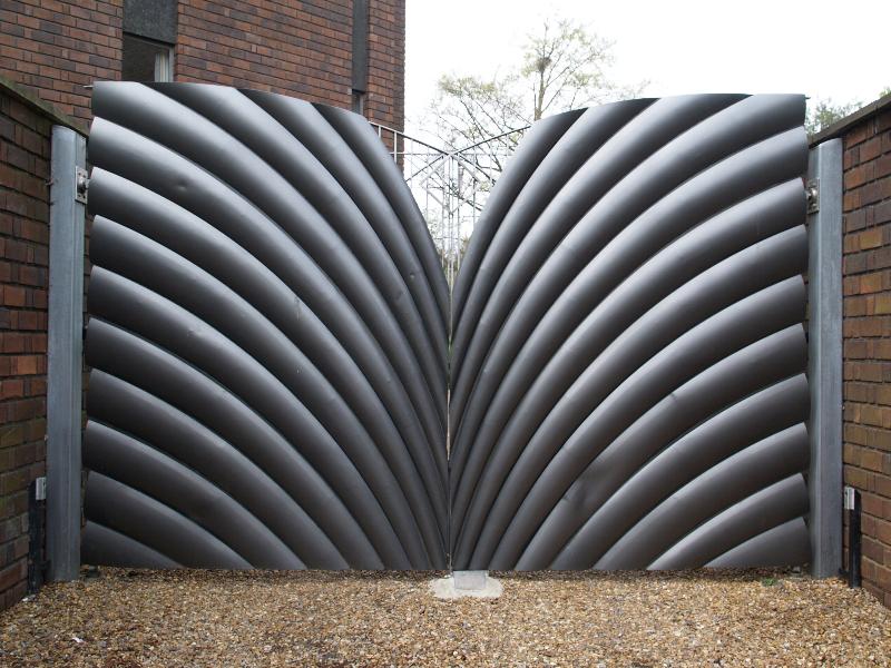Cambridge, England: Sidney Sussex College: car park gate (2005, artist Oliver Russell, commissioned by Pleasance Hookham and Nix as part of work on Blundell Court)