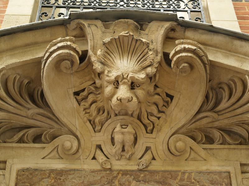 Paris, France: 8 ter Rue la Fontaine: lion decoration over door (1889, architect Gustave Rives)
