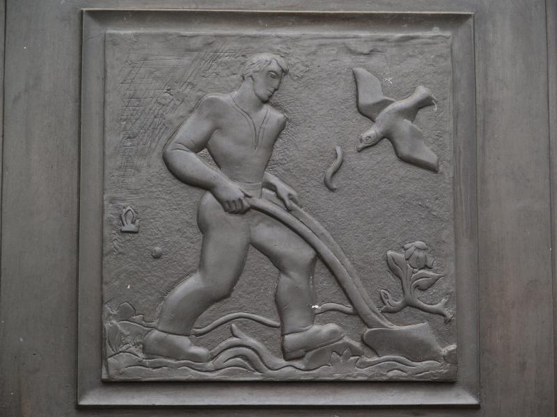 Cambridge, England: Guildhall: man ploughing field (1933, sculptor Gertrude Hermes)