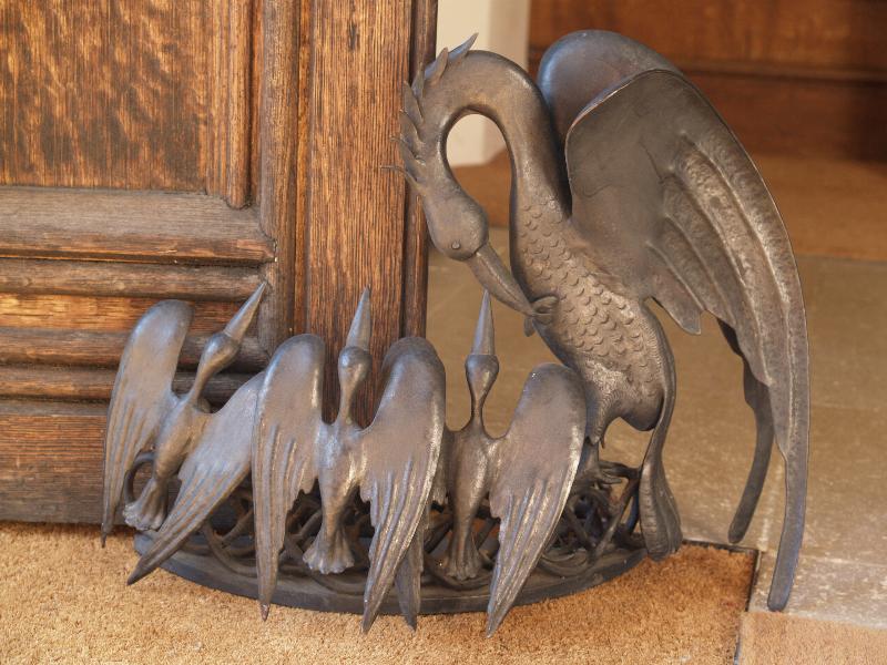 Cambridge, England: Corpus Christi College: chapel, pelican door stop