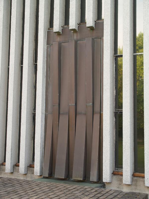 Cambridge, England: Churchill College: door (1961, sculptor Geoffrey Clarke)