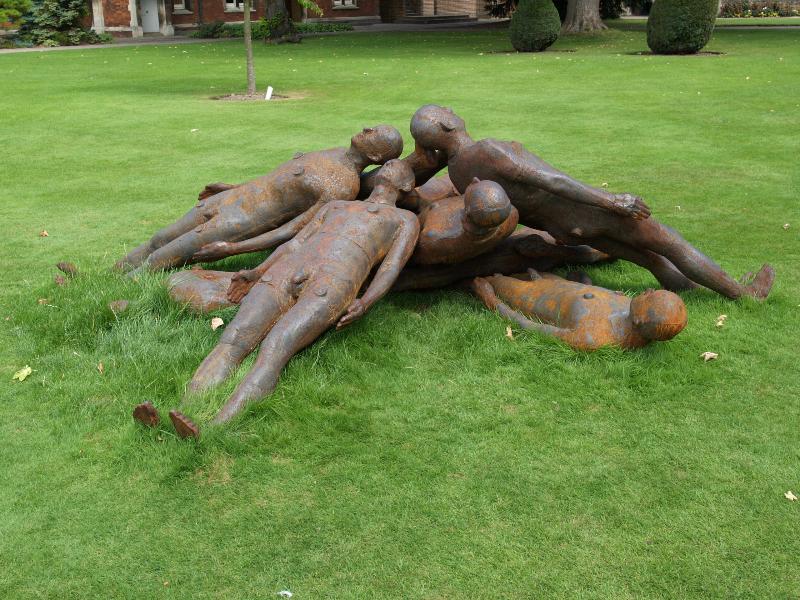 Cambridge, England: Jesus College: pile of figures (2006, sculptor Antony Gormley)
