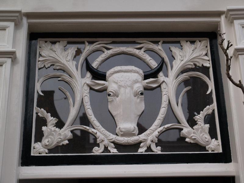 Leiden, Netherlands: 51 Lange Mare: decoration over door, a cow
