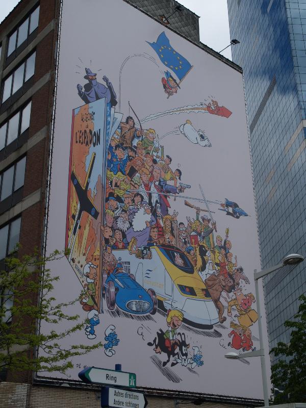 Brussels, Belgium: Rue Ernest Blerot: Eurostar and cartoon characters from Editions du Lombard (2008, Johan de Moor)