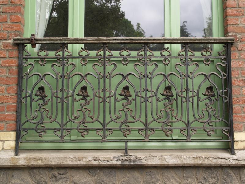 Brussels, Belgium: 111 Avenue Ducpetiaux: window ironwork grille