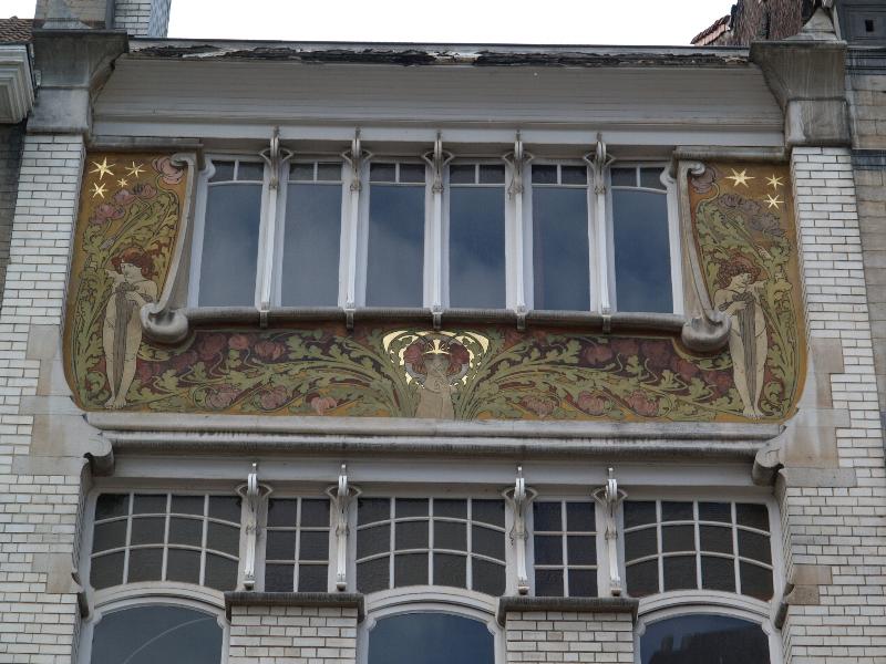 Brussels, Belgium: 83 Rue Faider: wall decoration at top of house (1900, architect Albert Roosenboom)