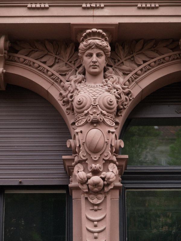Heidelberg, Germany: 126 Hauptstrasse: female column decoration
