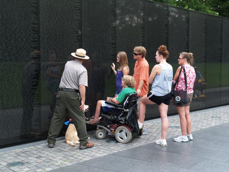 Washington, DC: Vietnam Veterans Memorial: finding the name (1982, designed by Maya Lin)