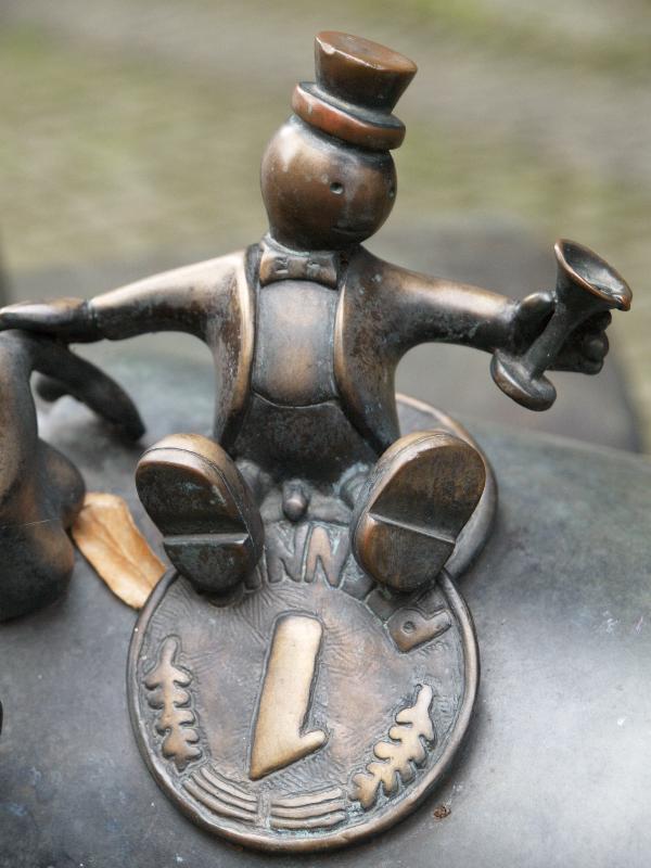 Munster, Germany: City Library (Stadtbucherei): figure detail, Superwoman (1993, Tom Otterness)