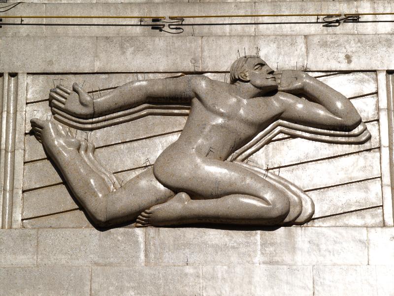 London, England: Cranbourne Street (Leicester Square), Vue Cinema (was Warner Theatre): Sight and Sound, male figure (1938, architects Edward A. Stone and T.R. Somerford, sculptor Edward Bainbridge Copnall)