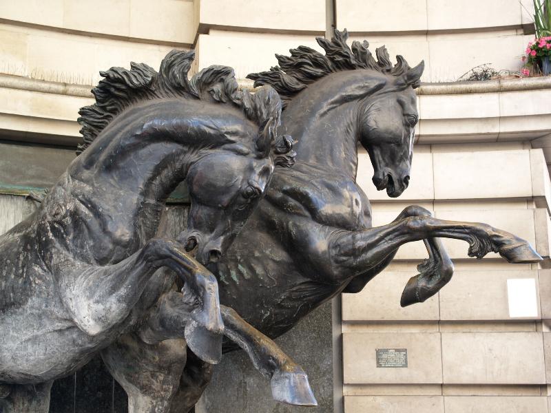 London, England: corner of Haymarket and Coventry Street: detail, The Horses of Helios (unveiled 1992, architect Peter Howard of RHWL Partnership, sculptor Rudy Weller)