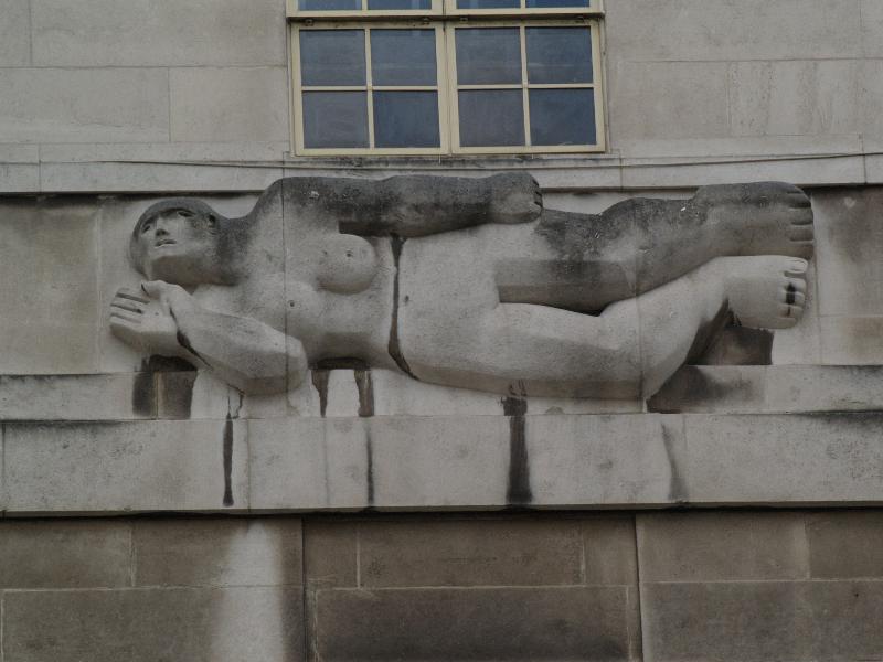 London, England: Broadway, Transport for London (originally London Underground): West Wind (1928-1929, sculptor Henry Moore, architect Charles Holden)