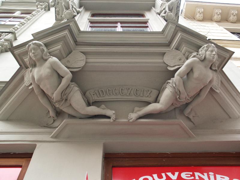 Brno, Czech Republic: Kapucinske namesti 11: fairies as support for oriel window (1899)