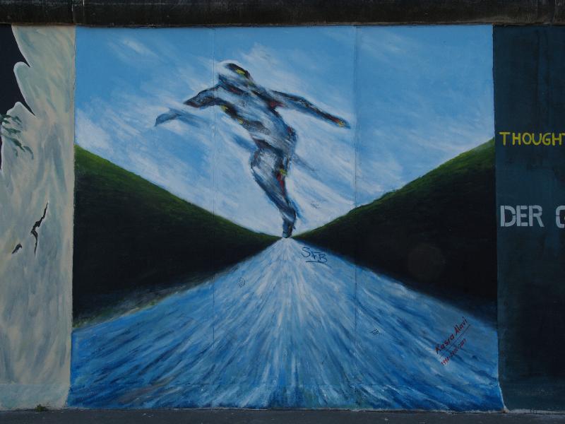 Berlin, Germany: East Side Gallery (Berlin Wall): Flucht (Escape) (1990/2000/2009, Kasra Alavi)