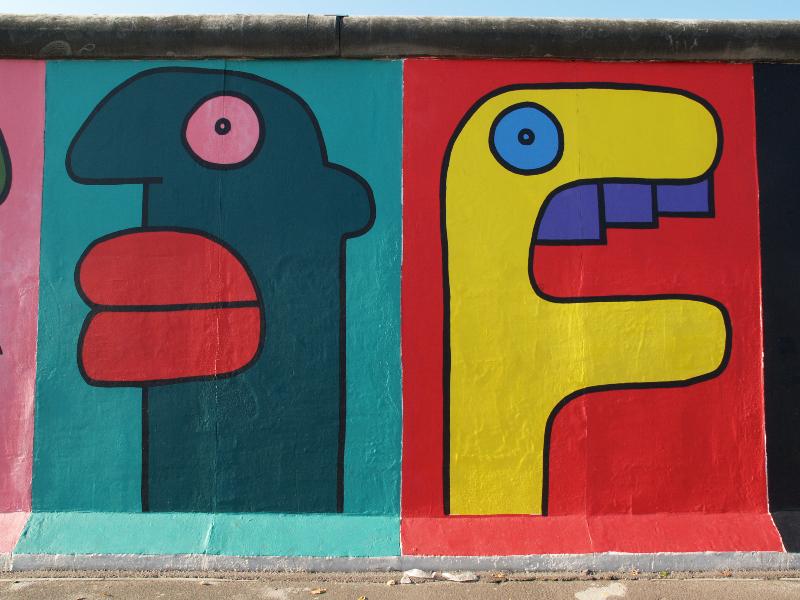 Berlin, Germany: East Side Gallery (Berlin Wall): faces (Thierry Noir)