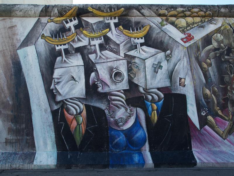 Berlin, Germany: East Side Gallery (Berlin Wall): heads and bananas (2009, Cesar Olhagaray)