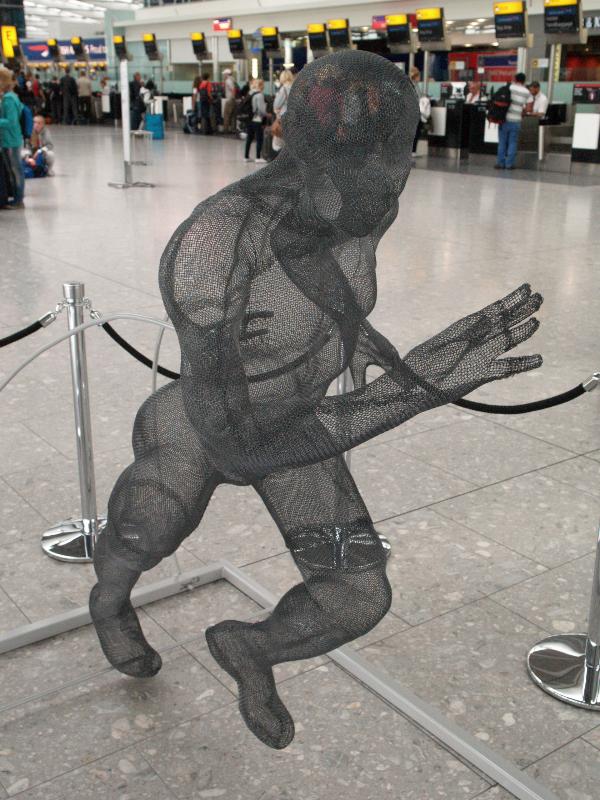 London, England: Heathrow Airport, Terminal 5: Jason Gardener (sculptor, Nikki Taylor)